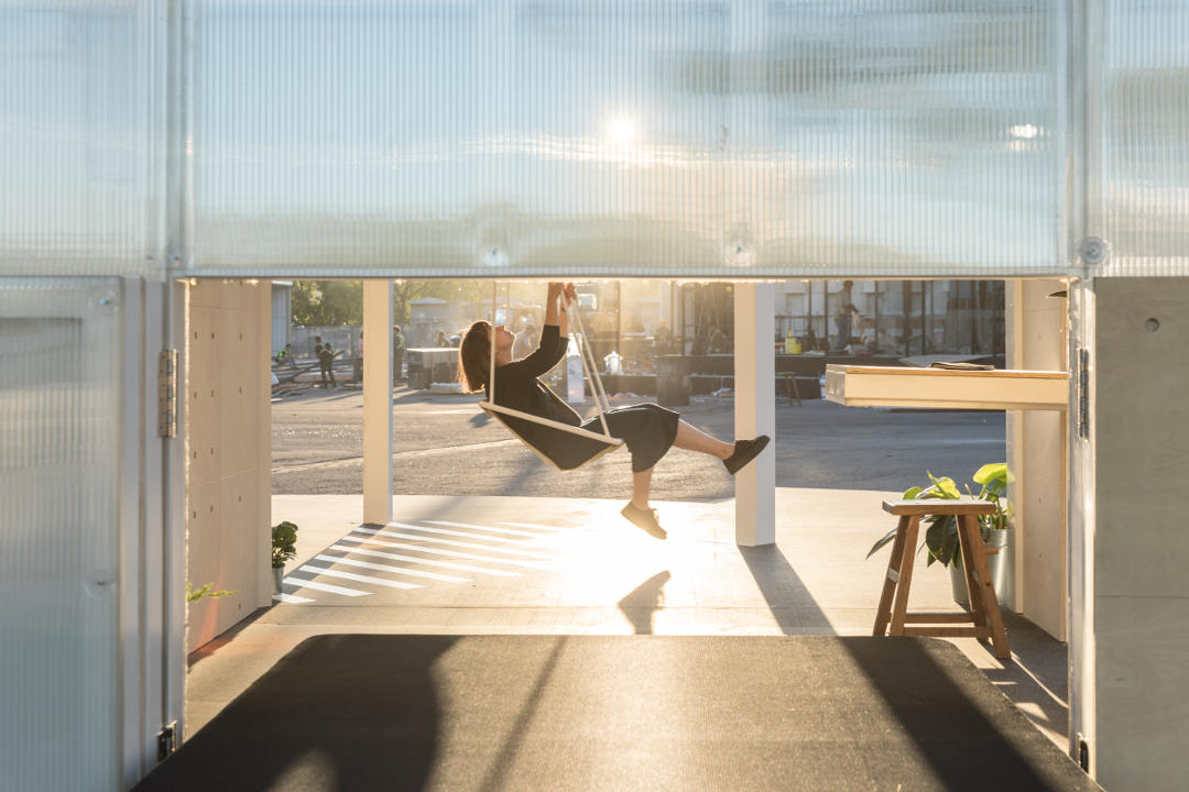 A chair in tHe living section of the MINI LIVING Urban Cabin